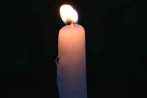 Image of lit candle from the Eating Disorder Center Foundation, Denver, 2016